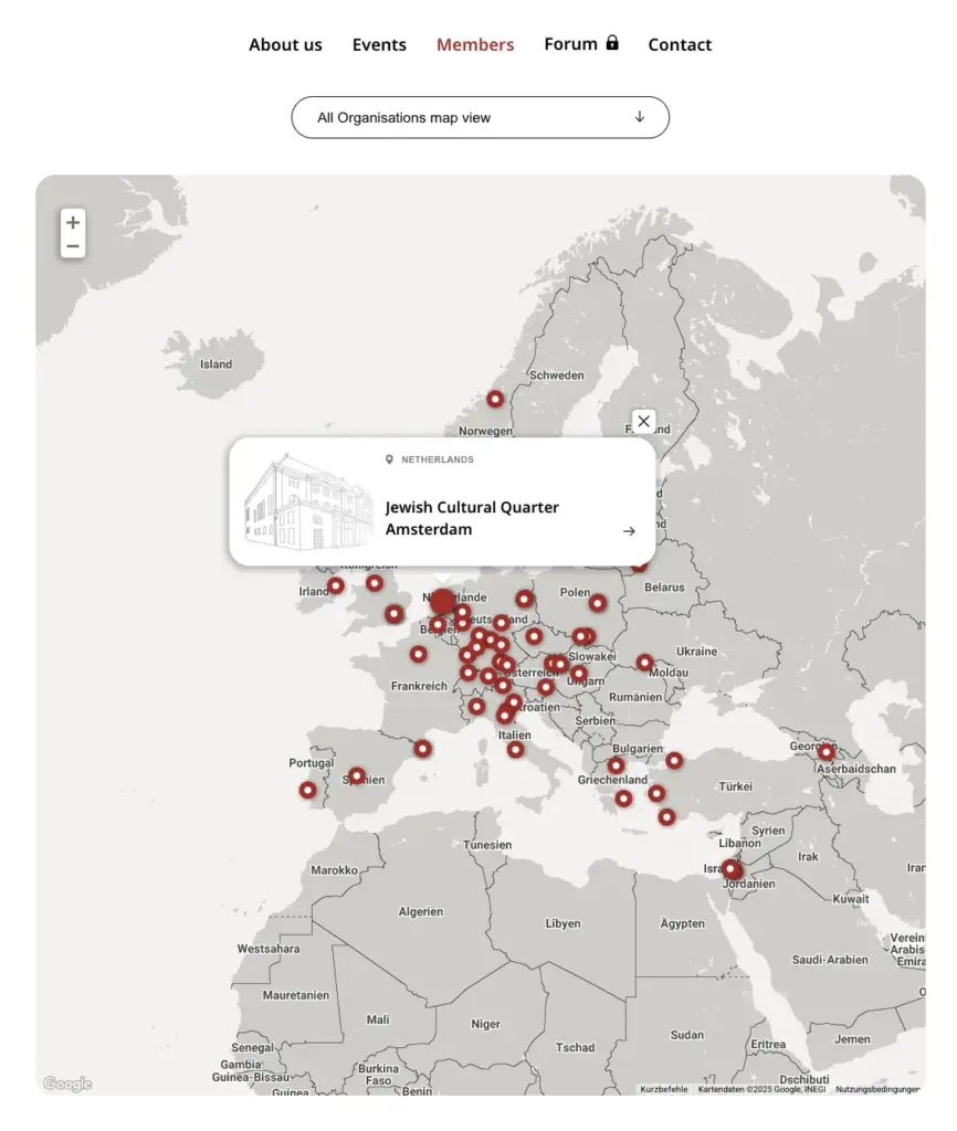 Fragment of the map view of the members overview page on aejm.org, showing dots for each member institution on the map. Screenshot from February 2025